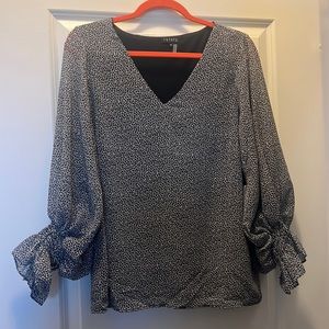 1. State long sleeve blouse size medium with tags. Never worn.